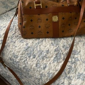 Loved MCM bag. Slightly worn Strap. Lots of room